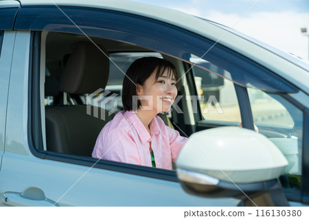 Woman in a car, woman driving a car, woman driving 116130380