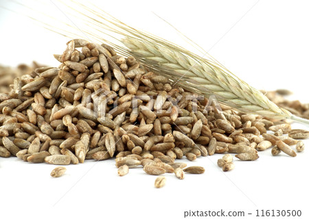 Pile of rye grains with rye stalks on a white background Pile of rye grains with rye stalks on a white background 116130500