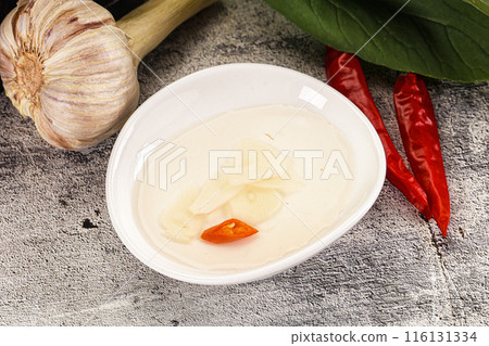Vietnamese spicy vinegar with garlic Vietnamese spicy vinegar with garlic 116131334