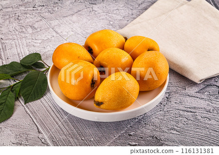 Ripe sweet juicy medlar fruit 116131381