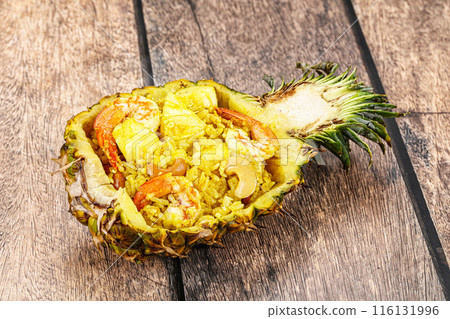 Thai cuisine - rice with prawn in pineapple Thai cuisine - rice with prawn in pineapple 116131996