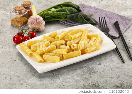 Italian cuisine - cooked pasta tortiglioni Italian cuisine - cooked pasta tortiglioni 116132043
