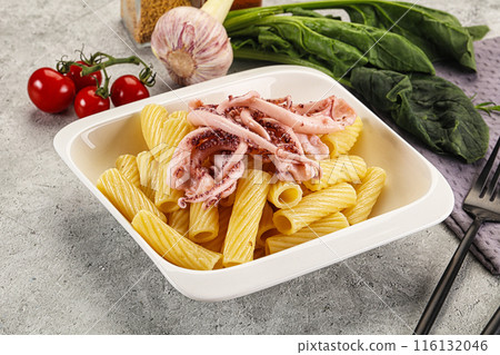 Italian cuisine - pasta tortiglioni with squid 116132046