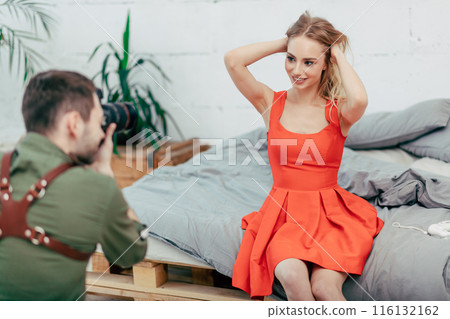 sensual sexy charming pleasant woman in stylish dress holding her hair sensual sexy charming pleasant woman in stylish dress holding her hair 116132162