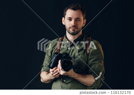 pleasant gorgeous professional photographer using a digital camera 116132170