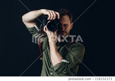 talented successful photographer taking a photo 116132171