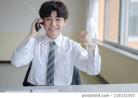 Smiling face, smartphone and businessman Smiling face, smartphone and businessman 116132503