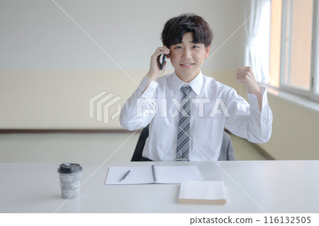 Smiling face, smartphone and businessman Smiling face, smartphone and businessman 116132505