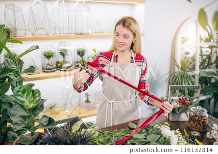 attractive gardener at work attractive gardener at work 116132814