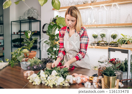 flowers composing and decoration by young lady flowers composing and decoration by young lady 116133478
