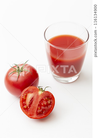 Tomato juice and tomatoes in a glass on a white background 116134900