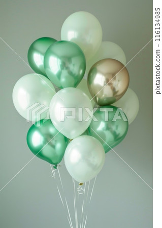 Shiny Green and White Balloons on a Festive Occasion 116134985