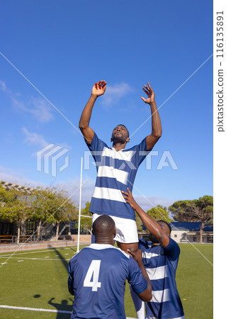 Three African American young male athletes training on a sunny day Three African American young male athletes training on a sunny day 116135891