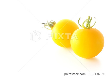 Yellow cherry tomatoes photographed on a white background Yellow cherry tomatoes photographed on a white background 116136196
