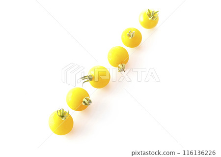 Yellow cherry tomatoes photographed on a white background Yellow cherry tomatoes photographed on a white background 116136226