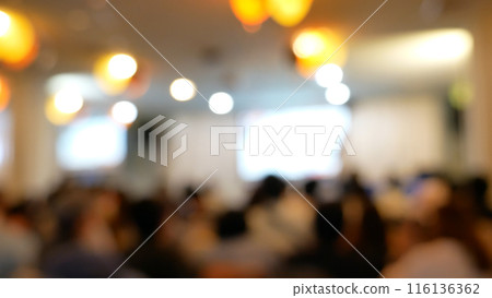 Blurred background people join seminar business event in auditorium hall convention. Presentation meeting at conference room present screen business. Blurred background with copy space Blurred background people join seminar business event in auditorium hall convention. Presentation meeting at conference room present screen business. Blurred background with copy space 116136362
