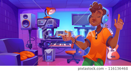 Young dj or music producer in sound record studio 116136468