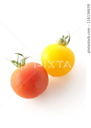 Yellow and red cherry tomatoes photographed on a white background Yellow and red cherry tomatoes photographed on a white background 116136639