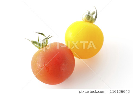 Yellow and red cherry tomatoes photographed on a white background Yellow and red cherry tomatoes photographed on a white background 116136643