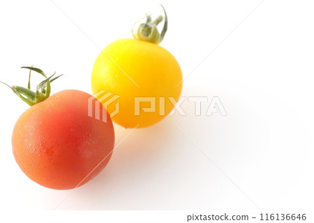 Yellow and red cherry tomatoes photographed on a white background Yellow and red cherry tomatoes photographed on a white background 116136646