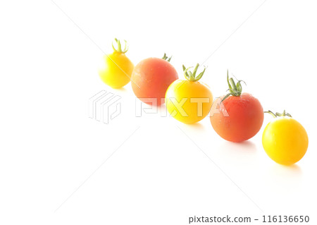 Yellow and red cherry tomatoes photographed on a white background Yellow and red cherry tomatoes photographed on a white background 116136650