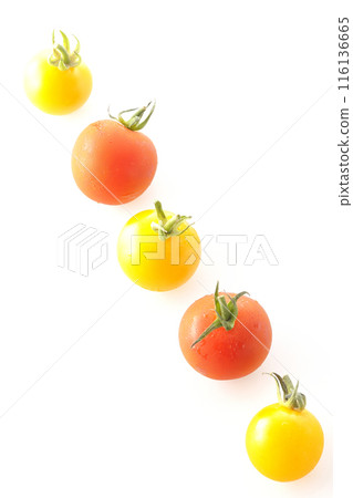 Yellow and red cherry tomatoes photographed on a white background Yellow and red cherry tomatoes photographed on a white background 116136665