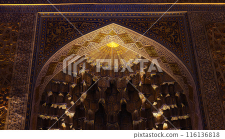 Mausoleum interior, deep niches and diverse muqarnas decoration Mausoleum interior, deep niches and diverse muqarnas decoration 116136818