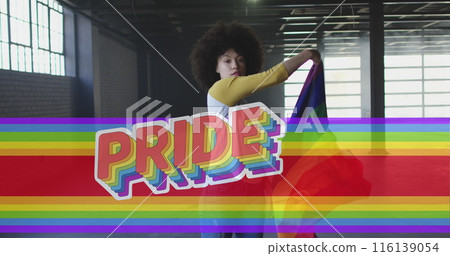 Image of rainbow flag over african american woman waving with flag Image of rainbow flag over african american woman waving with flag 116139054