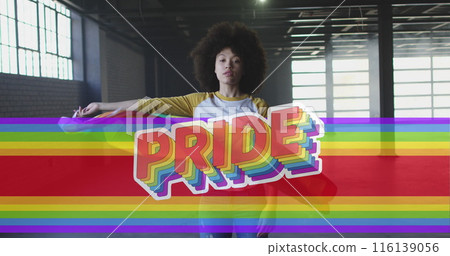 Image of rainbow flag over african american woman waving with flag Image of rainbow flag over african american woman waving with flag 116139056