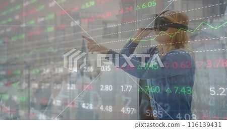 Image of financial data processing over caucasian woman using vr headset Image of financial data processing over caucasian woman using vr headset 116139431
