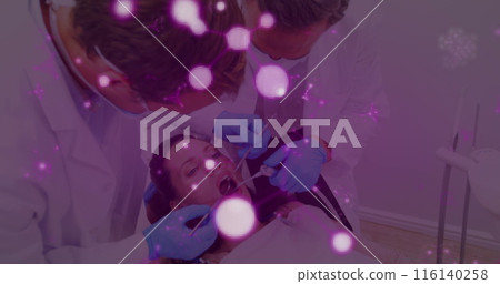 Image of molecules flowing over male dentist in face mask treating female patient in dentist chair 116140258