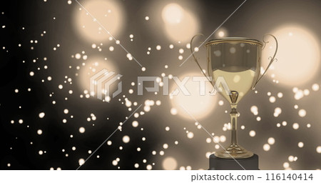 Image of a gloden cup over white shapes floating on black background with white lights Image of a gloden cup over white shapes floating on black background with white lights 116140414