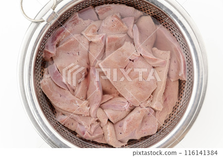Draining the blood from pork liver Draining the blood from pork liver 116141384