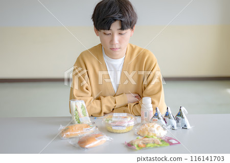 Lots of food and young men Lots of food and young men 116141703