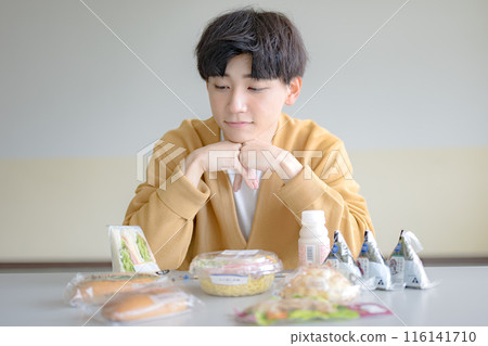 Lots of food and young men Lots of food and young men 116141710