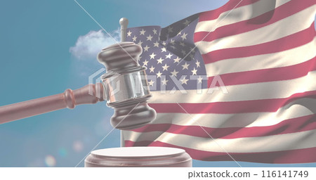 A gavel rests in front of American flag, symbolizing law and justice A gavel rests in front of American flag, symbolizing law and justice 116141749