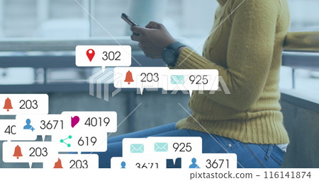 A middle-aged African American chef holding smartphone A middle-aged African American chef holding smartphone 116141874