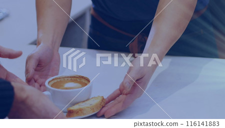 Person handing over coffee and cake to another, both standing at table Person handing over coffee and cake to another, both standing at table 116141883