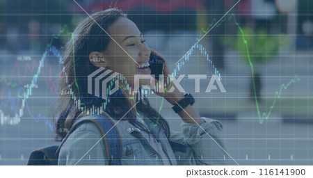 Young biracial professional wearing casual clothes, laughing on phone 116141900