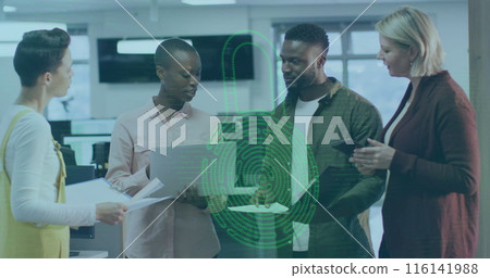 Diverse team discussing over digital interface in office Diverse team discussing over digital interface in office 116141988