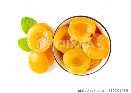 Canned Peaches, Apricot Halves in Syrup, Yellow Fruit Dessert, Tinned Nectarine Compote Canned Peaches, Apricot Halves in Syrup, Yellow Fruit Dessert, Tinned Nectarine Compote 116141989