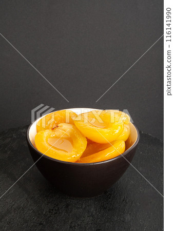 Canned Peaches, Apricot Halves in Syrup, Yellow Fruit Dessert, Tinned Nectarine Compote Canned Peaches, Apricot Halves in Syrup, Yellow Fruit Dessert, Tinned Nectarine Compote 116141990