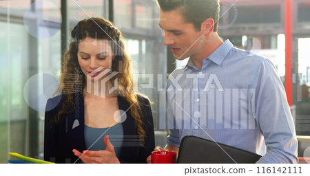 Caucasian chef and assistant looking at tablet, holding files and cup 116142111