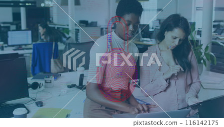 Diverse team working together, looking at laptop 116142175