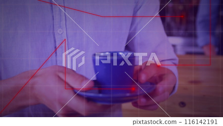 Caucasian chef holding blue cup, assistant in background Caucasian chef holding blue cup, assistant in background 116142191