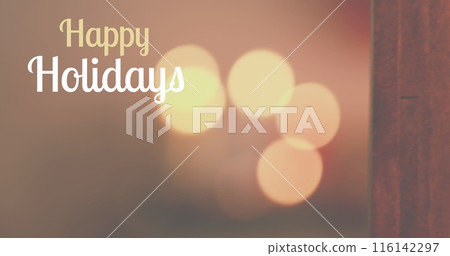 Warm lights glowing softly in background, Happy Holidays text shining Warm lights glowing softly in background, Happy Holidays text shining 116142297