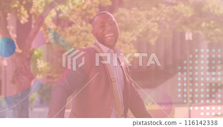 African American cyclist/enthusiast, middle-aged, laughing outdoors 116142338