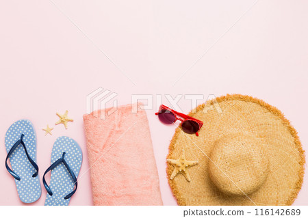 Top view travel or vacation concept. Composition with stylish beach accessories on colored background, top view. Beach fashion flat lay, summer concept. Trendy colors Top view travel or vacation concept. Composition with stylish beach accessories on colored background, top view. Beach fashion flat lay, summer concept. Trendy colors 116142689