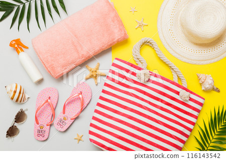 Composition with stylish beach accessories on colored background, top view. Beach fashion flat lay, summer concept. Trendy colors 116143542