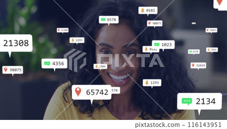 Image of multiple notification bars, biracial woman talking and smiling while clapping in office 116143951